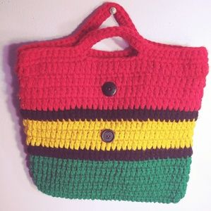 Red gold and green hand purse